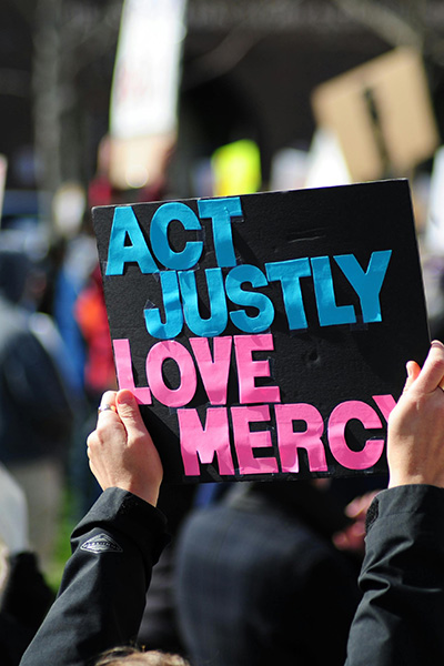 Rally with a sign being held up