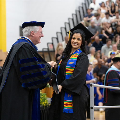graduate with her diploma
